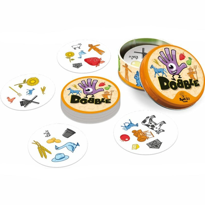 blik met kaarten van het spel dobble boerderij met kaarten los 