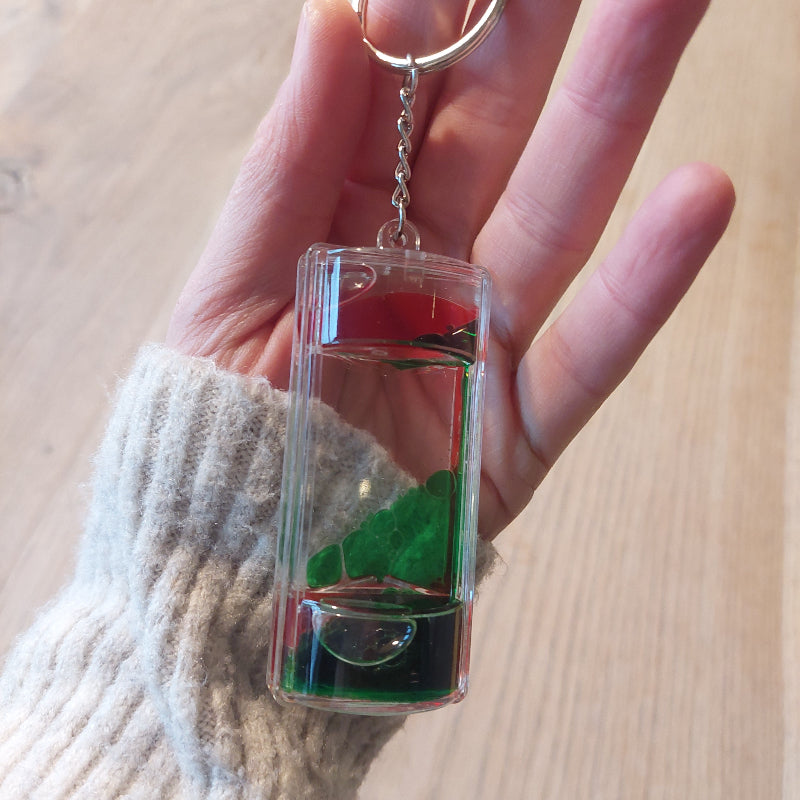 sleutelhanger liquid timer in hand, sensoriek materiaal, zandloper, fidget