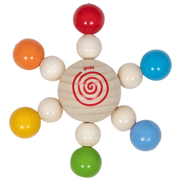 Rattle pearl spinning top